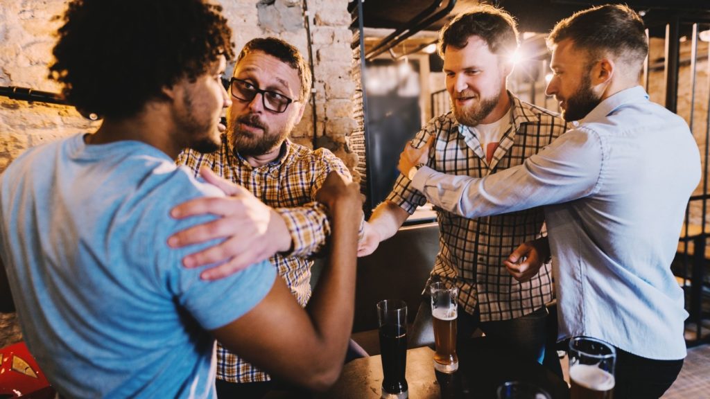 Men fighting in a bar